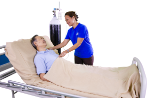 caregiver-helping-patient-with-oxygen